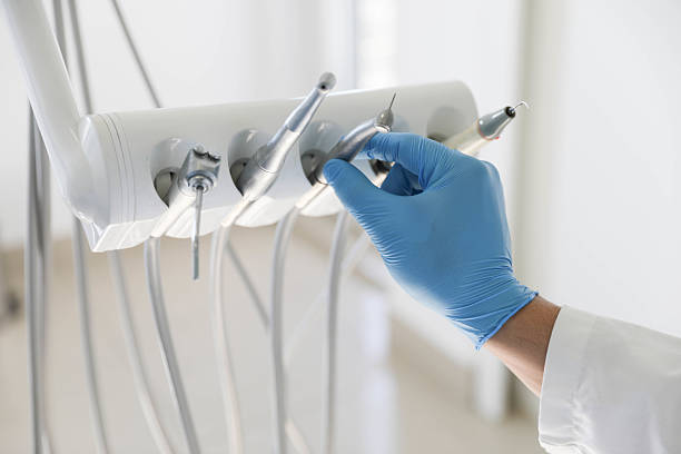 Professional Tooth Extraction technician working in Russells Point, OH